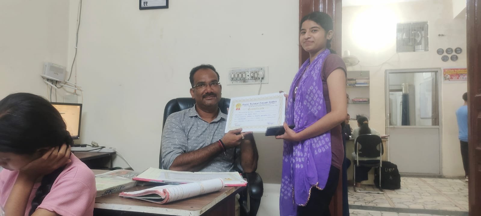 Certificate presentation at HTCI
